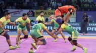 Pawan Kumar attempts a jump on Ravinder